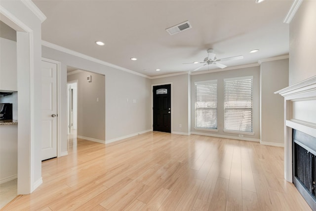 unfurnished living room featuring ceiling fan, a fireplace, recessed lighting, light wood-style flooring, and baseboards