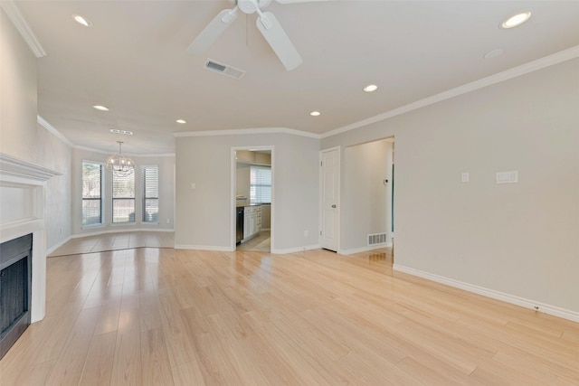 unfurnished living room featuring a fireplace, crown molding, ceiling fan, baseboards, and light wood-type flooring