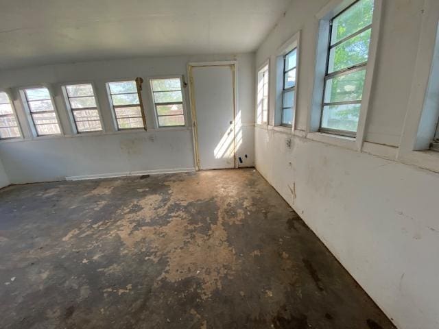 4219 Parkwood Dr, San Antonio, TX 78218 - empty room with unfinished concrete flooring