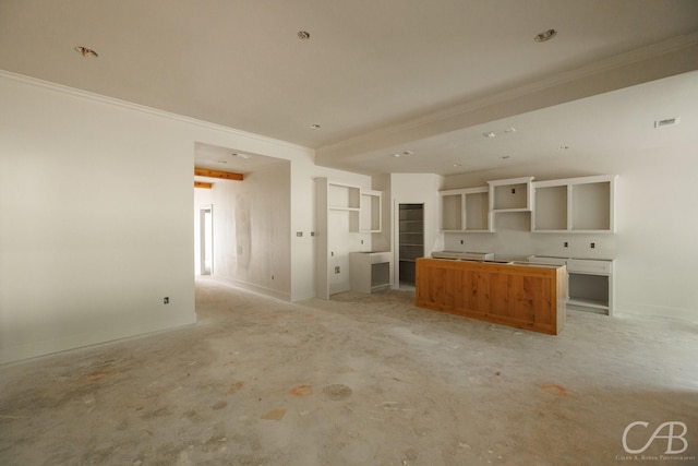 1206 Lytle Acres Dr, Abilene, TX 79602 - unfurnished living room with ornamental molding, unfinished concrete floors, and baseboards