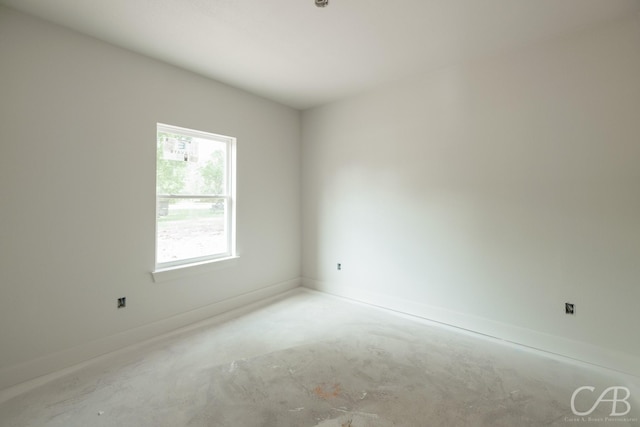 1206 Lytle Acres Dr, Abilene, TX 79602 - empty room with concrete floors and baseboards