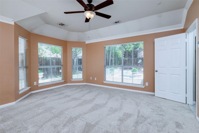 empty room featuring ceiling fan, baseboards, carpet, and visible vents