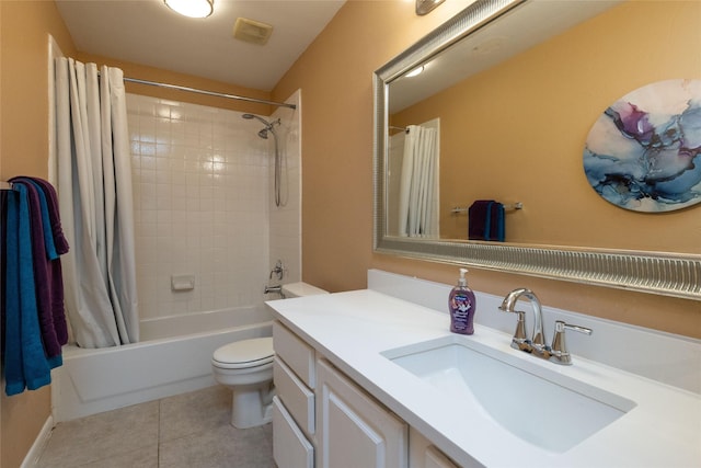 bathroom featuring tile patterned flooring, toilet, shower / tub combo with curtain, and vanity