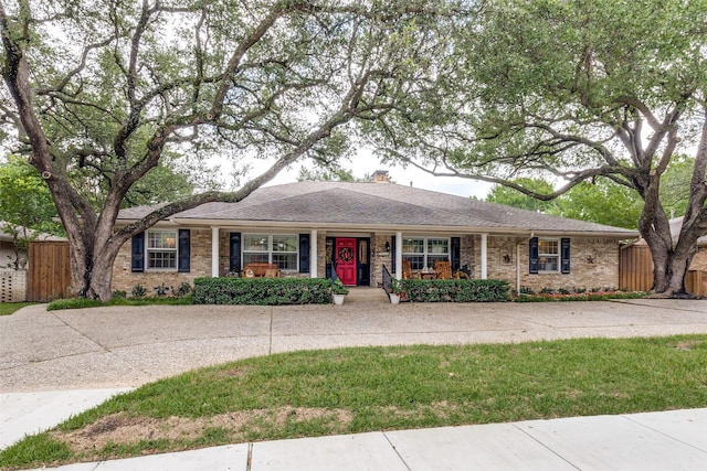 7261 Ashington Dr, Dallas, TX 75225 - ranch-style house with a porch, brick siding, and a chimney