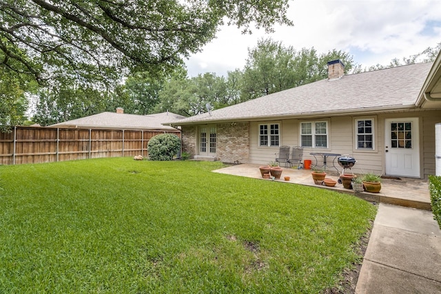 7261 Ashington Dr, Dallas, TX 75225 - rear view of house with a patio area, a chimney, roof with shingles, and french doors