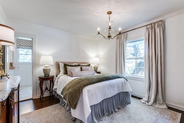4661 Mockingbird Ln, Highland Park, TX 75209 - bedroom with a chandelier, crown molding, wood finished floors, and baseboards