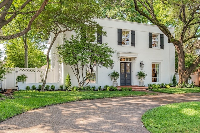 4661 Mockingbird Ln, Highland Park, TX 75209 - view of front of home with french doors and driveway