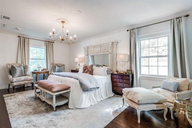 4661 Mockingbird Ln, Highland Park, TX 75209 - bedroom with wood finished floors, a chandelier, and crown molding