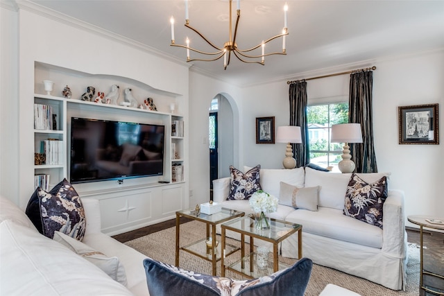 4661 Mockingbird Ln, Highland Park, TX 75209 - living area with crown molding, arched walkways, a chandelier, and built in shelves