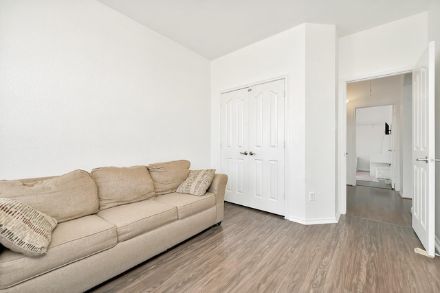 living room with wood finished floors and baseboards