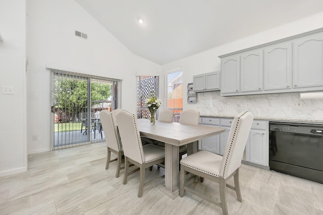 dining area with high vaulted ceiling, baseboards, visible vents, and recessed lighting
