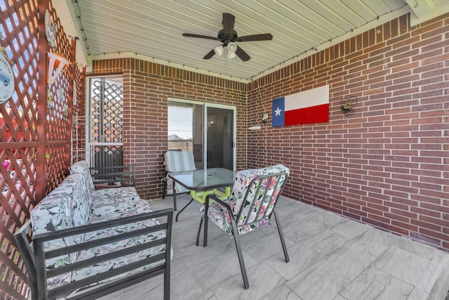 view of patio / terrace featuring ceiling fan and outdoor dining area
