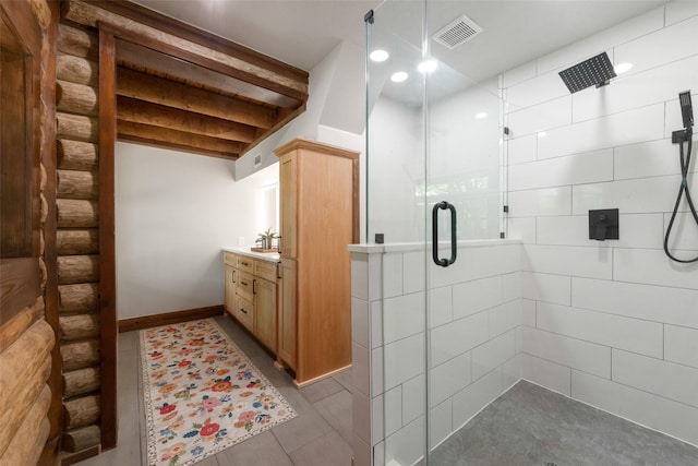 bathroom with a shower stall, log walls, vanity, and visible vents