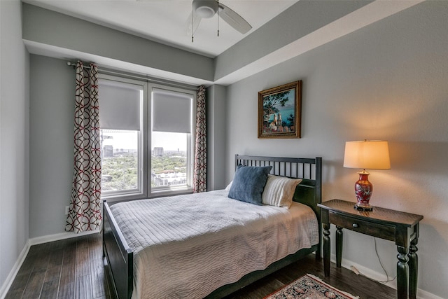 4611 Travis St Unit 1408B, Dallas, TX 75205 - bedroom with baseboards, dark wood-type flooring, and ceiling fan