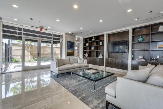 4611 Travis St Unit 1408B, Dallas, TX 75205 - living area featuring built in features, french doors, and recessed lighting