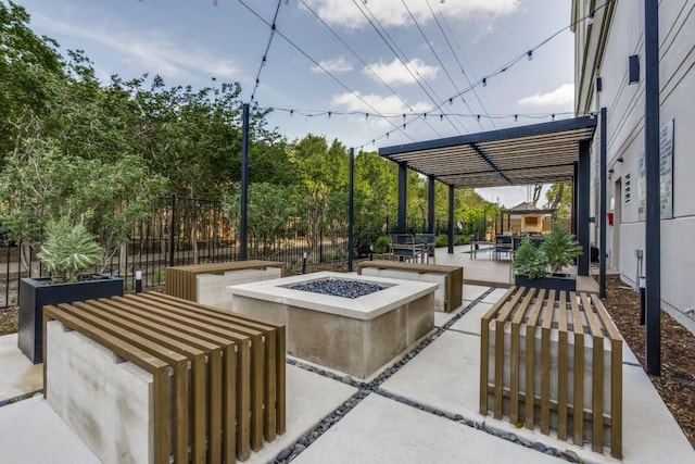 4611 Travis St Unit 1408B, Dallas, TX 75205 - view of patio / terrace featuring a fire pit and outdoor dining area