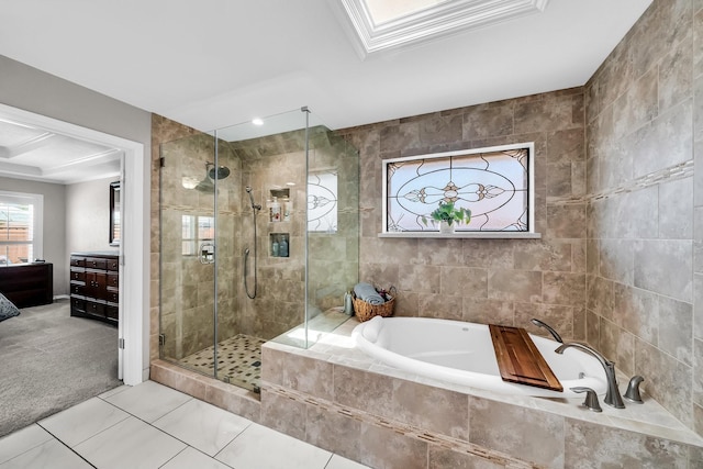 1409 Thames Dr, Plano, TX 75075 - bathroom featuring a shower stall, a bath, and tile patterned flooring