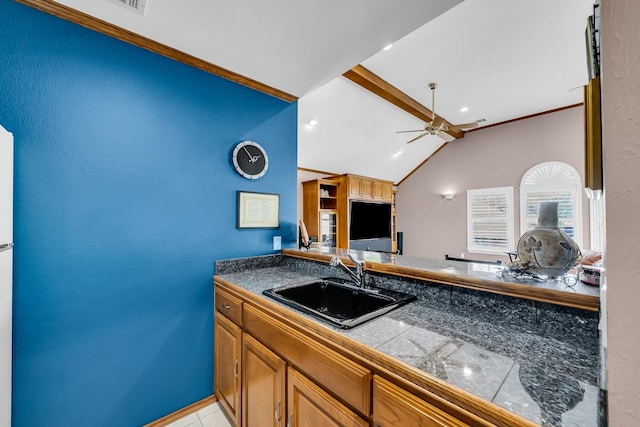 1409 Thames Dr, Plano, TX 75075 - kitchen featuring tile countertops, lofted ceiling with beams, a ceiling fan, recessed lighting, and a sink