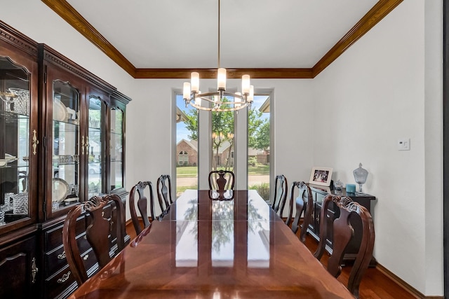 1409 Thames Dr, Plano, TX 75075 - dining space featuring ornamental molding, baseboards, a notable chandelier, and wood finished floors