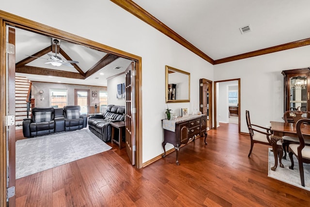 1409 Thames Dr, Plano, TX 75075 - living room with ceiling fan, dark wood finished floors, ornamental molding, visible vents, and baseboards