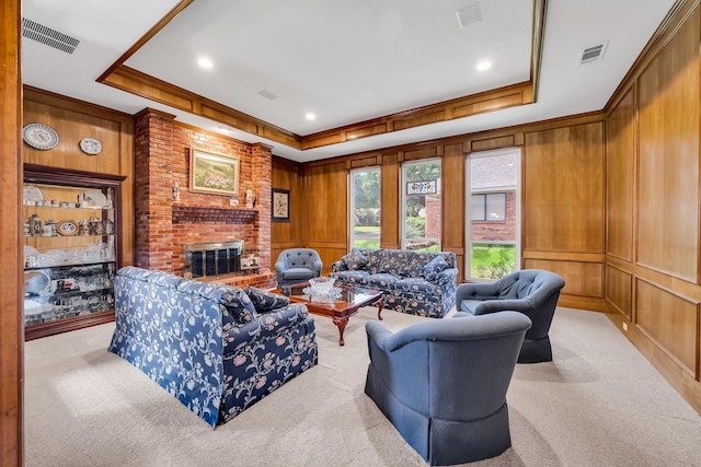 1409 Thames Dr, Plano, TX 75075 - living area with wooden walls, a tray ceiling, visible vents, and a fireplace