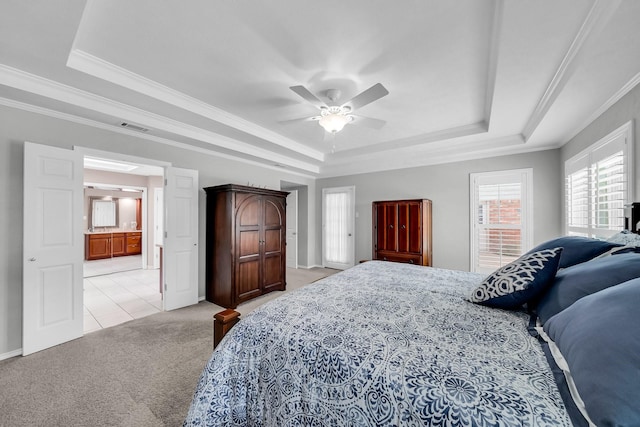 1409 Thames Dr, Plano, TX 75075 - bedroom featuring ornamental molding, a raised ceiling, light colored carpet, and visible vents