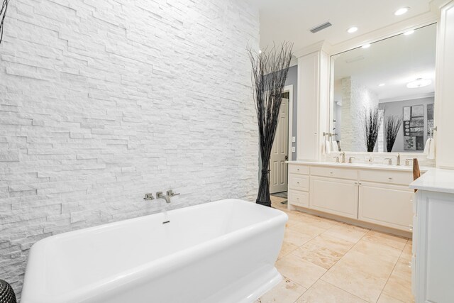 5 Cypress Ct, Heath, TX 75032 - bathroom with vanity, a freestanding tub, and recessed lighting