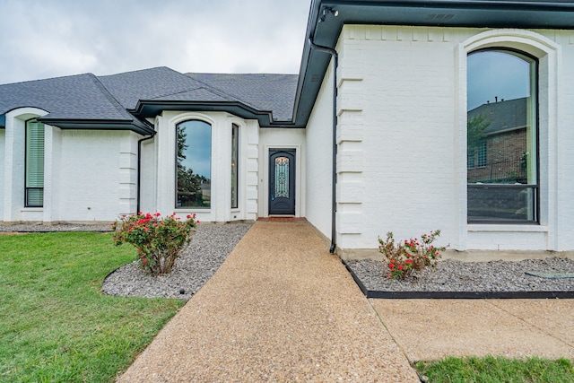 5 Cypress Ct, Heath, TX 75032 - entrance to property featuring roof with shingles, a yard, and brick siding