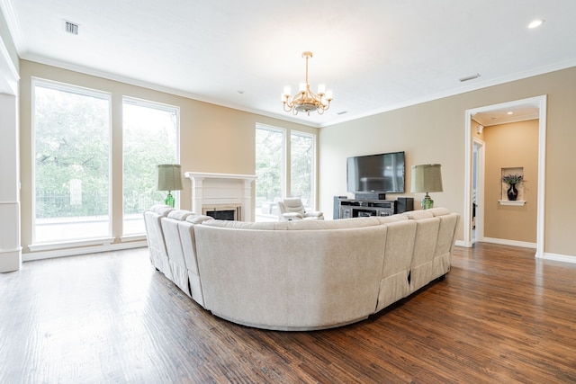 5 Cypress Ct, Heath, TX 75032 - living area featuring a fireplace, dark wood-style floors, a chandelier, ornamental molding, and baseboards