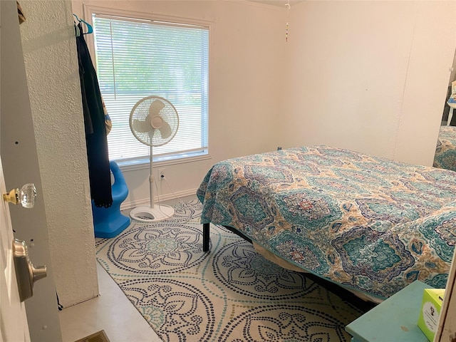 bedroom with baseboards