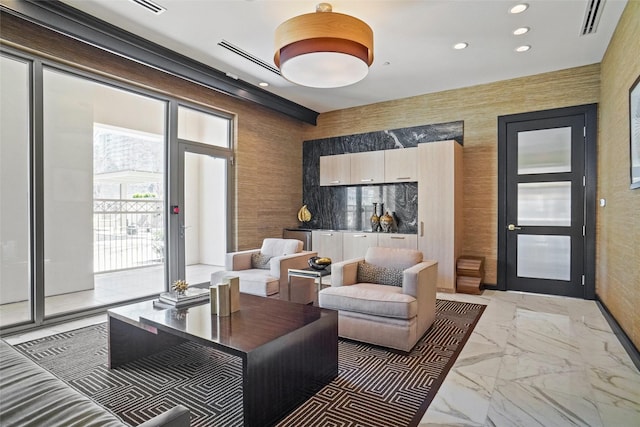 interior space featuring visible vents, recessed lighting, and marble finish floor