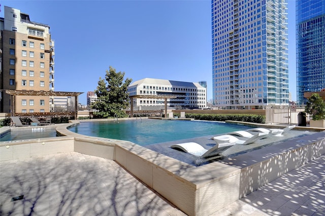 pool featuring a patio area