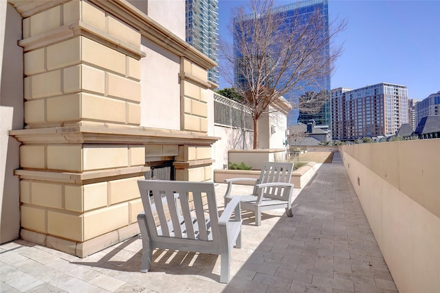 view of patio featuring a city view