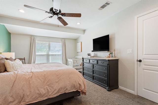 bedroom featuring light carpet, recessed lighting, visible vents, and baseboards