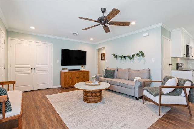 living room with ceiling fan, dark wood finished floors, visible vents, and recessed lighting