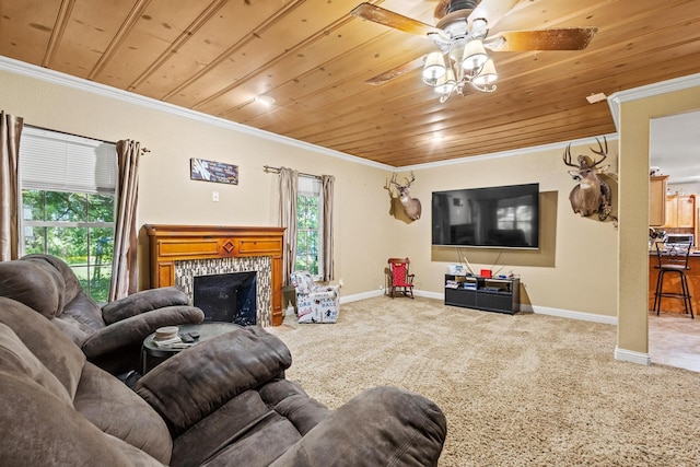 living room featuring wooden ceiling, baseboards, carpet, and ornamental molding