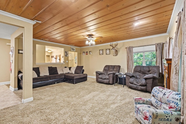 living area featuring wooden ceiling, baseboards, ornamental molding, and carpet