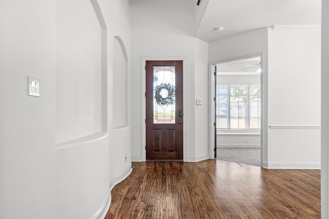 1208 Claire St, Lantana, TX 76226 - foyer entrance with wood finished floors, arched walkways, and baseboards