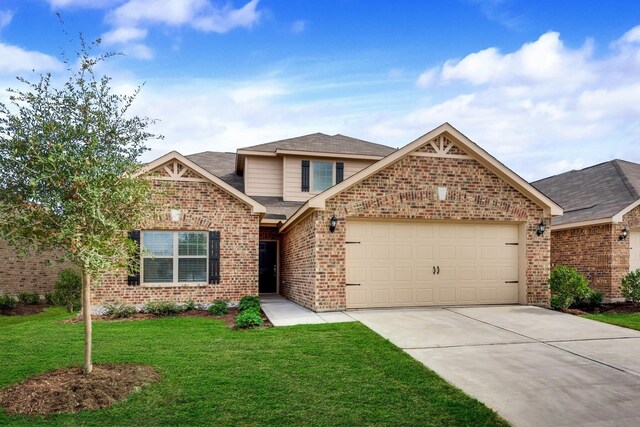 view of front of home with roof with shingles, driveway, a front yard, brick siding, and a garage