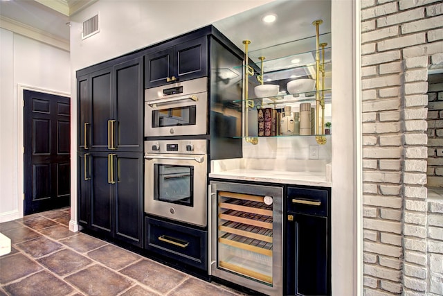 5919 Club Hill Pl, Dallas, TX 75248 - kitchen featuring visible vents, dark cabinets, wine cooler, crown molding, and stainless steel double oven