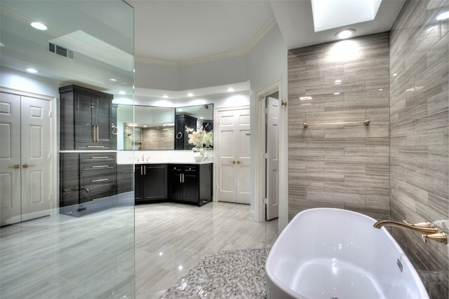 5919 Club Hill Pl, Dallas, TX 75248 - full bathroom featuring visible vents, tile walls, a soaking tub, crown molding, and vanity