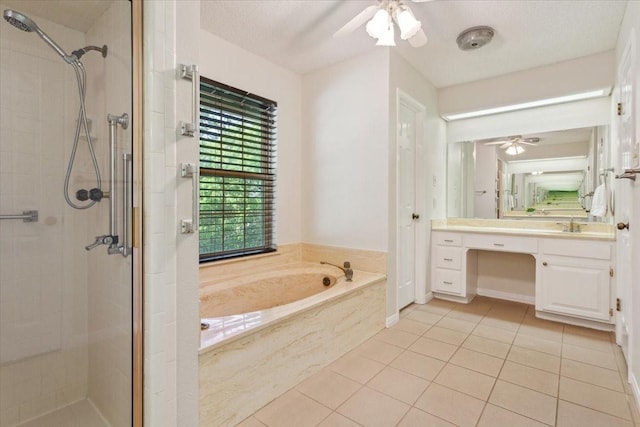 10010 Lost Oak Ridge Dr, Woodway, TX 76712 - bathroom featuring a ceiling fan, a shower stall, a bath, and vanity