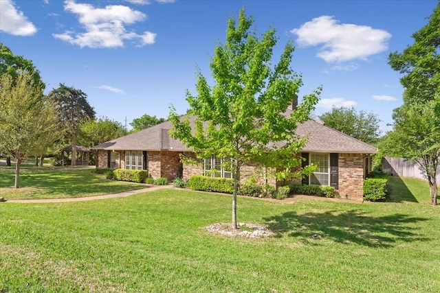 10010 Lost Oak Ridge Dr, Woodway, TX 76712 - view of front of house with a front lawn, brick siding, and roof with shingles