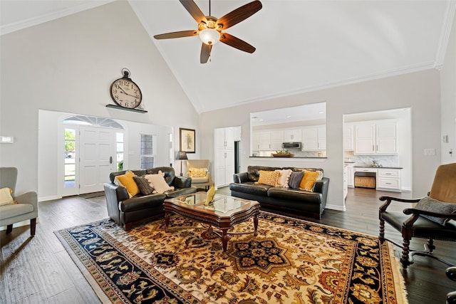 living room featuring ornamental molding, dark wood finished floors, high vaulted ceiling, and a ceiling fan