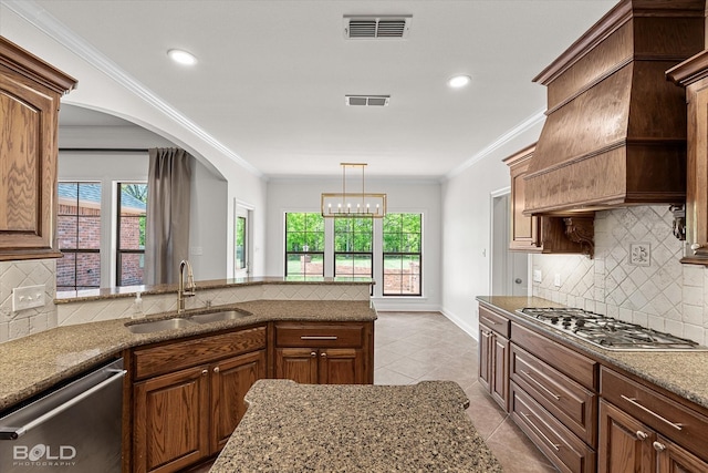 106 Horseguards Ave, Bossier City, LA 71111 - kitchen with visible vents, tasteful backsplash, a sink, appliances with stainless steel finishes, and light tile patterned floors