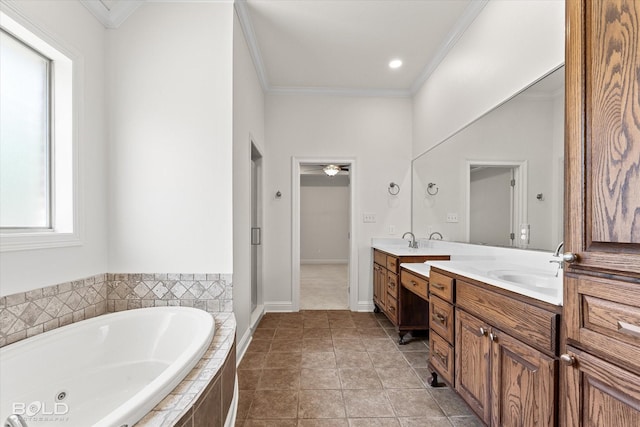 106 Horseguards Ave, Bossier City, LA 71111 - full bath with a sink, double vanity, baseboards, a tub with jets, and ornamental molding