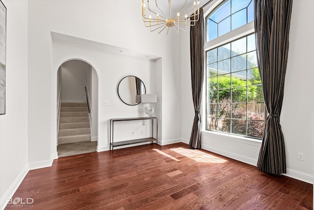106 Horseguards Ave, Bossier City, LA 71111 - interior space with arched walkways, plenty of natural light, stairs, and wood finished floors