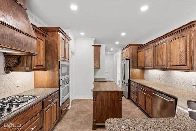 106 Horseguards Ave, Bossier City, LA 71111 - kitchen with crown molding, stainless steel appliances, recessed lighting, and dark stone countertops