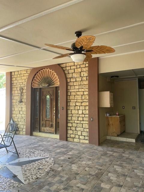 3915 Mather Ct, Dallas, TX 75211 - doorway to property with a ceiling fan
