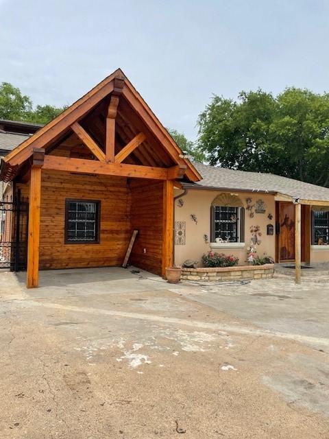 3915 Mather Ct, Dallas, TX 75211 - view of front of house featuring stucco siding